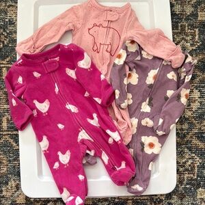 Pink and Purple baby footies